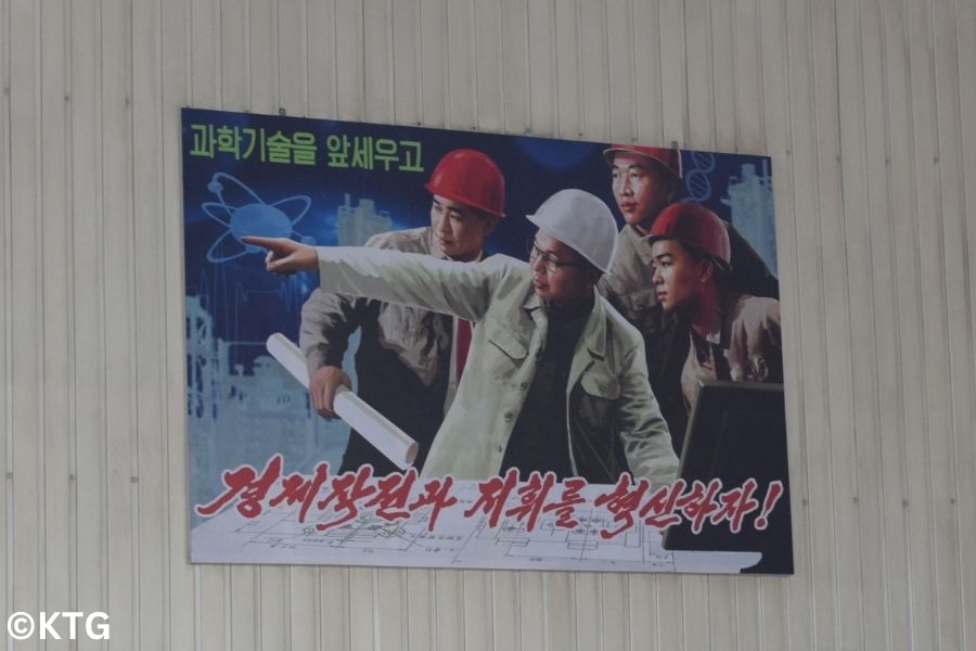 North Korean propaganda poster at the Taean glass factory in north Korea Tour arranged by KTG Tours