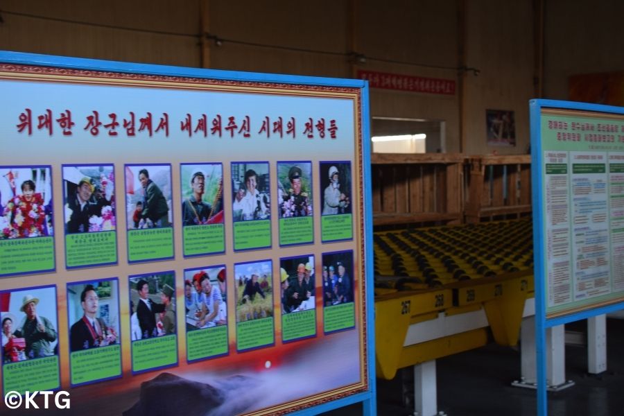 North Korean propaganda poster at the Taean glass factory in north Korea Tour arranged by KTG Tours