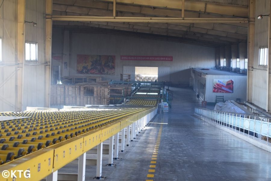 Production line at the Taen Glass Factory in Nampo, North Korea, DPRK. Tour arranged by KTG tours