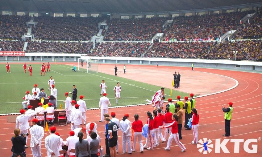 North Korean footballers celebrating a goal at Kim Il Sung Stadium in Pyongyang capital of North Korea (DPRK). Picture taken by KTG Tours.