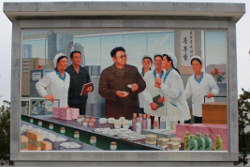 Image du leader Kim Jong Il dans une usine de cosmétiques à Sinuiju en Corée du Nord