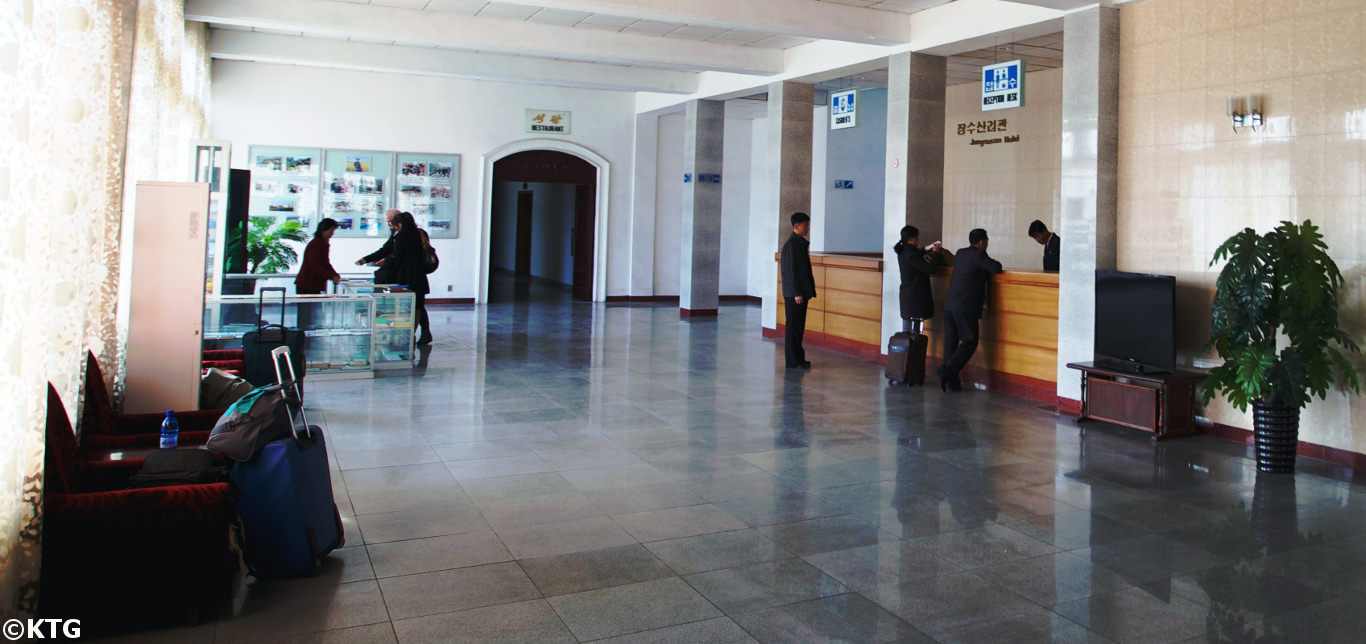 North Koreans checking-in at the Jangsusan Hotel in Pyongsong city, North Korea (DPRK). Tour arranged by KTG Tours