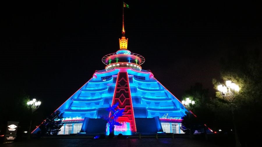 building brightly lit at night in Ashgabat, capital of Turkmenistan