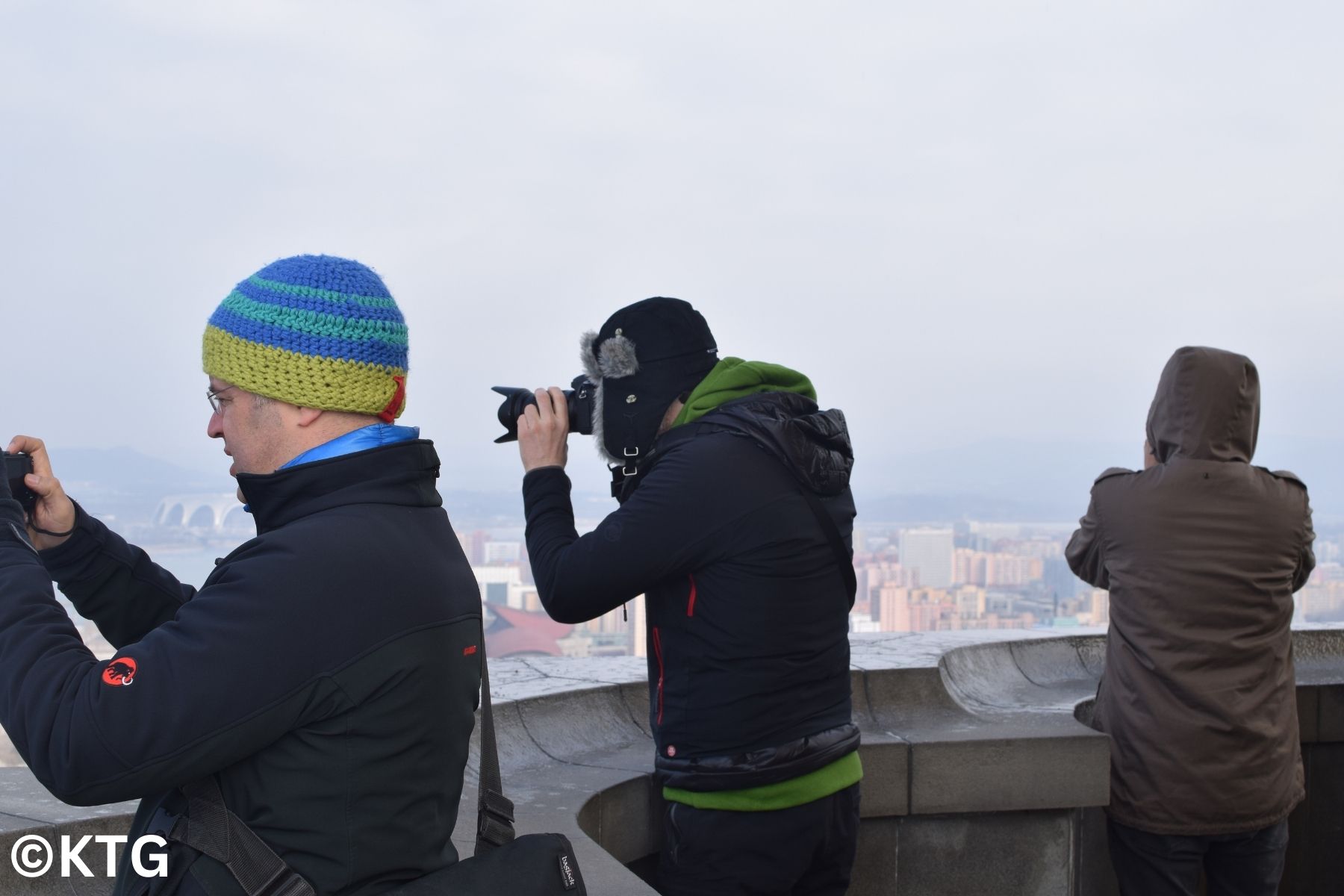 KTG travellers atop the Juche Tower in February in Pyongyang, North Korea (DPRK), for the Birthday of General Kim Jong Il