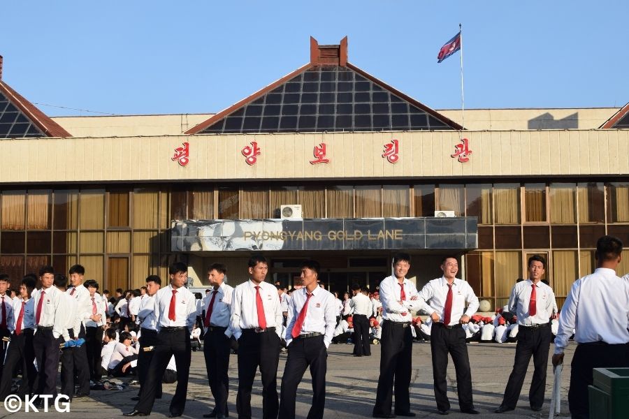 North Korean university students outside the Pyongyang Gold Lane bowling alley in North Korea, the DPRK. Tour arranged by KTG tours