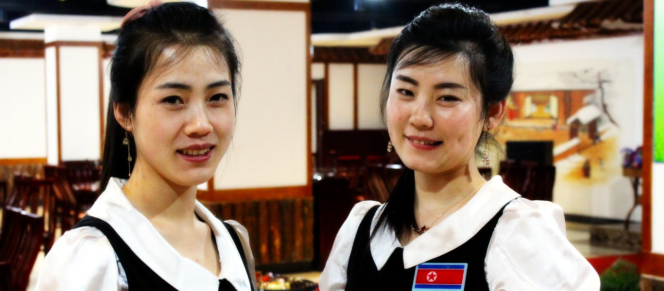 North Korean waitresses in a DPRK restaurant