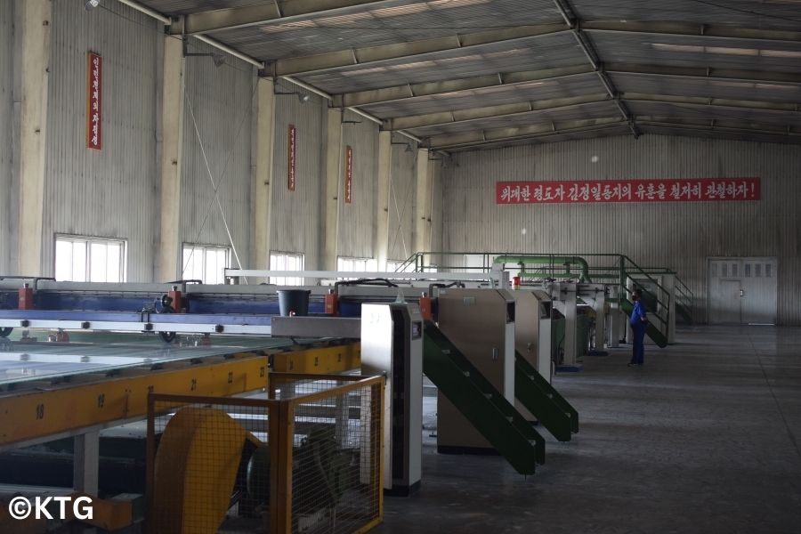 Glass cutting at the Tae'an Glass Factory in Nampo, North Korea (DPRK)