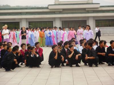 outside the Mausoleum where you get to see Kim Il Sung